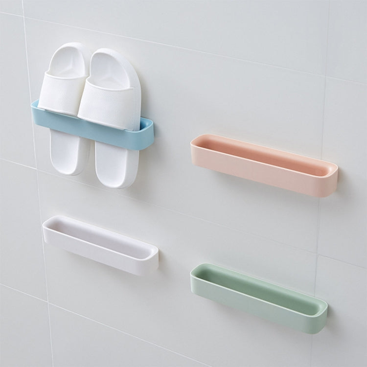 Wall-mounted slipper shelf system with multiple pastel bars for slippers