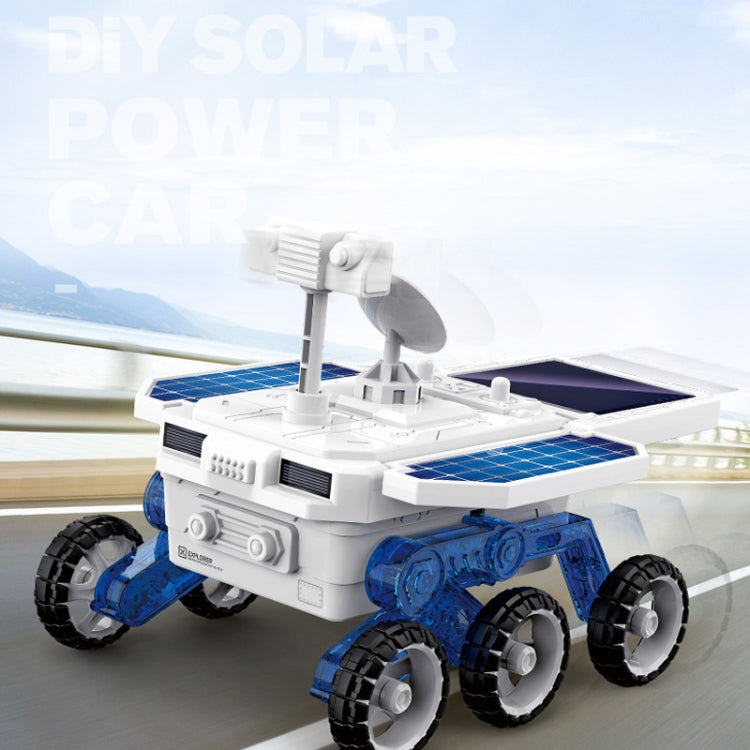 White and blue solar Mars exploration car toy with solar panel roof and four large wheels.