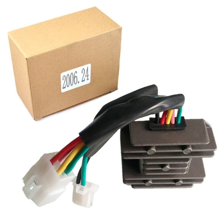 Motorcycle rectifier with wire harness and black finned heatsink, with shipping box