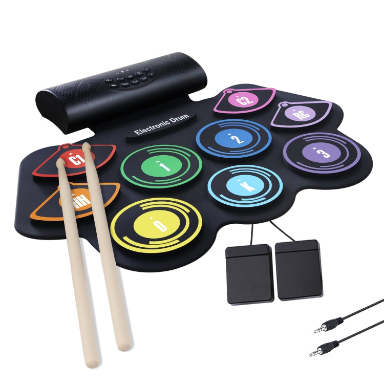 Electronic drum set with drum sticks, two foot pedals, and connected cables