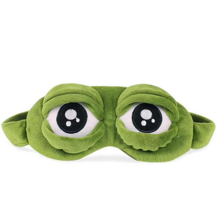 Green frog plush eye mask with wide cartoon eyes and side ear tabs