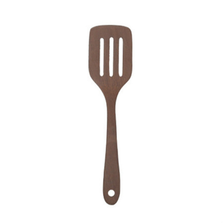 Unpainted wooden long-handled slotted spatula for cooking and serving vegetables
