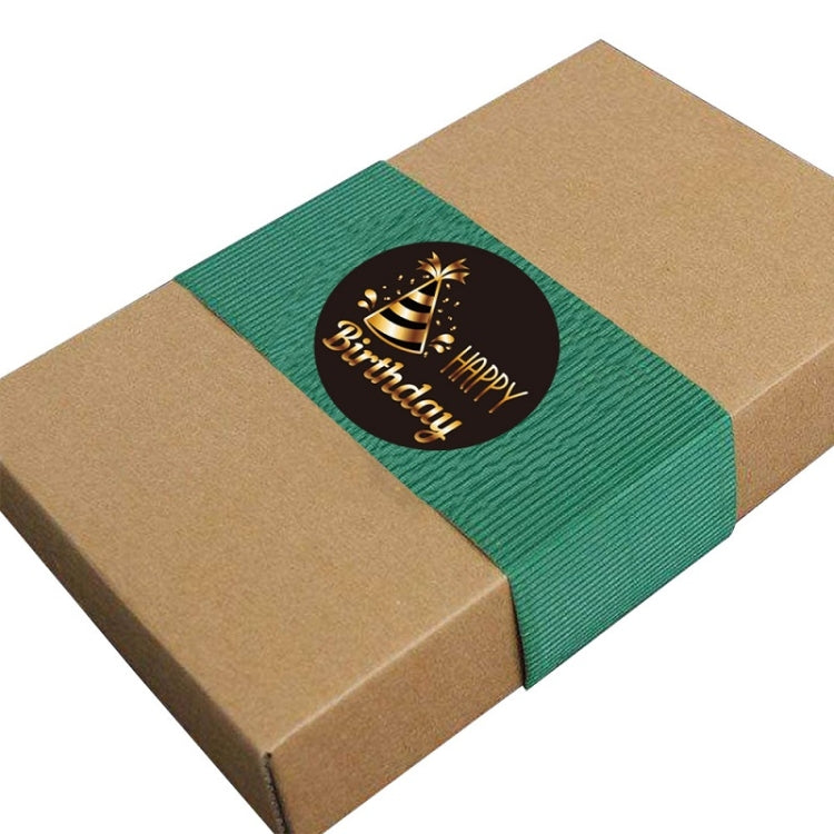 Kraft gift box with green ribbon and round “Happy Birthday” sticker in gold