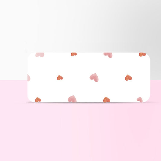Transparent label sticker with pink heart and small orange pattern