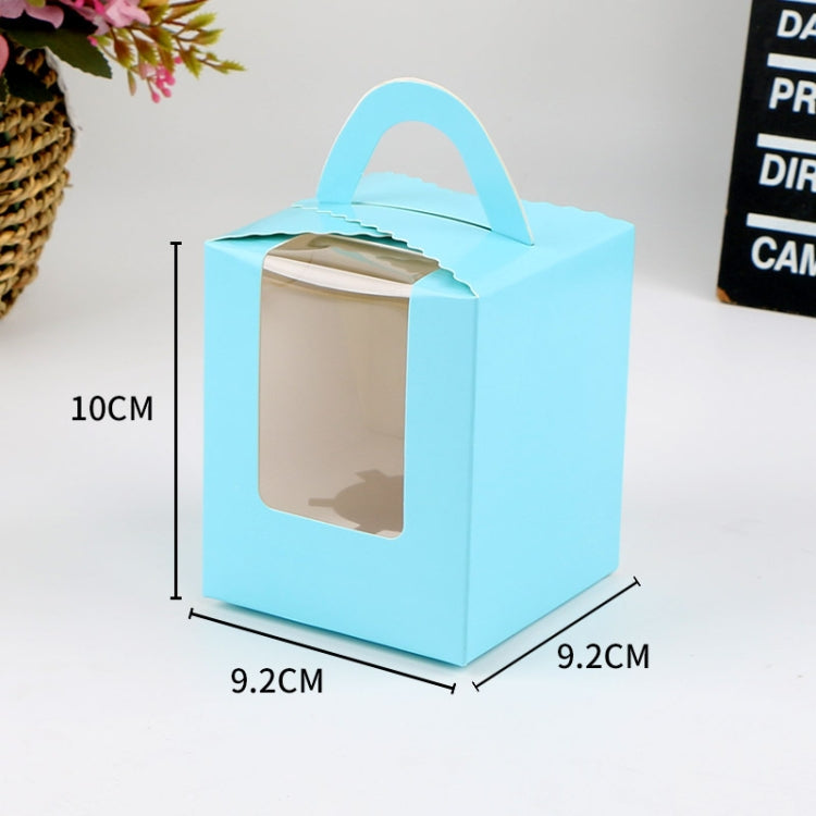 Light blue cardboard cupcake box with clear window and curved handle