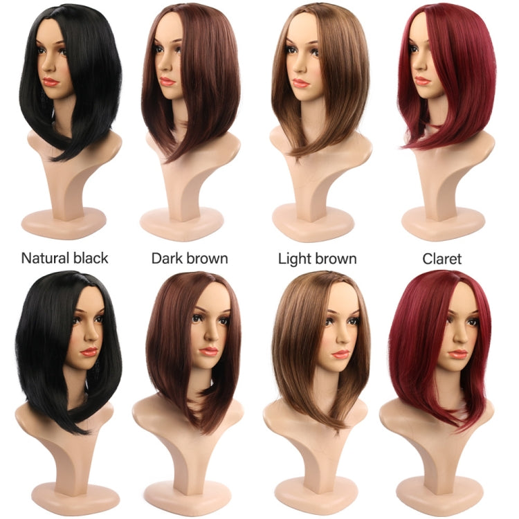 Short synthetic bob wigs in multiple colors displayed on mannequins
