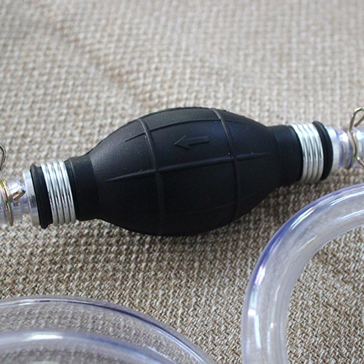Black inline pump handle connector with metal threads and clear hose end