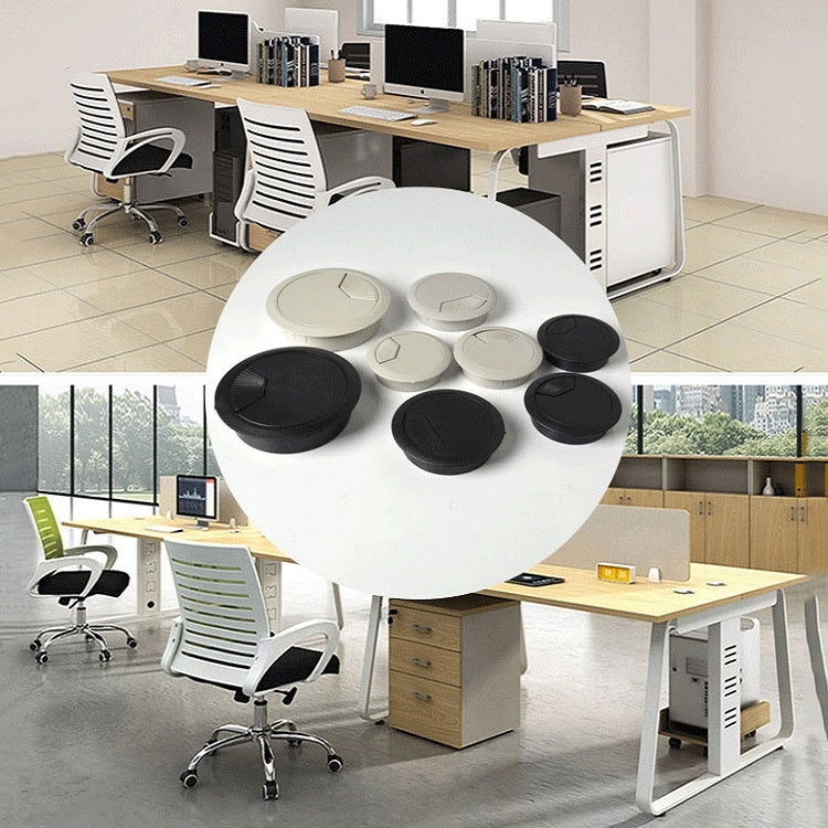 Desk cable hole cover set with round black and white inserts on office table