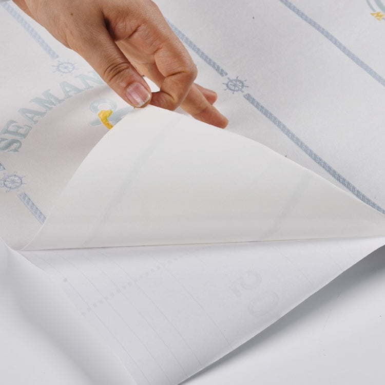 Self-adhesive star and moon wallpaper sheet being applied, white with light blue lines