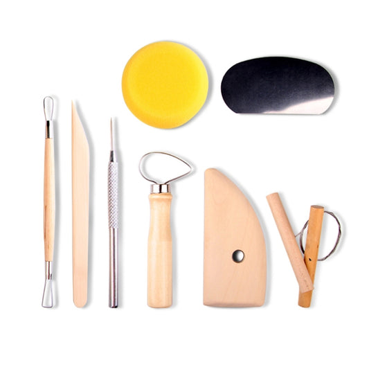 Pottery clay sculpting tools assortment with wooden handles, wire loops, and foam pad