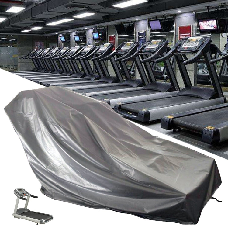 Gray treadmill cover with silver reflective surface and black base straps