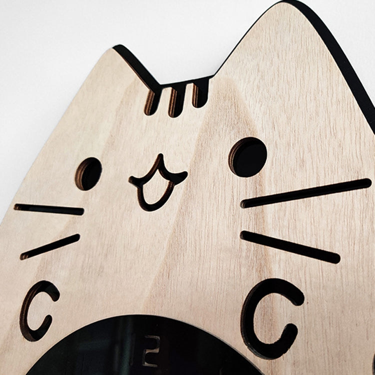 Close-up cat wooden wall clock face with whiskers and nose over black round dial