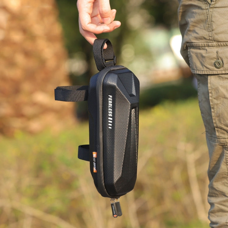 Black hard-shell front bicycle bag held by side handle with mounting strap