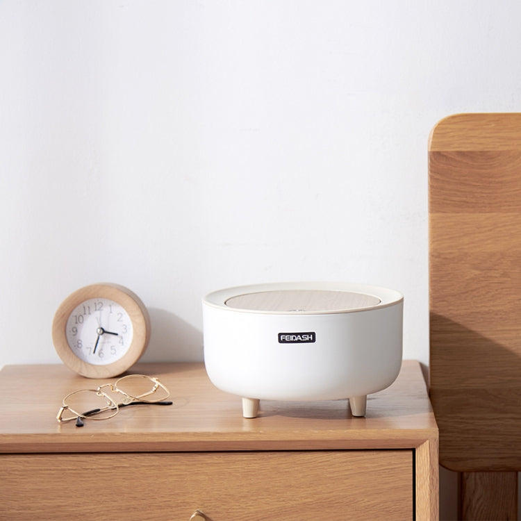 Round mini desktop trash can on bedside table, white body with wood-look lid