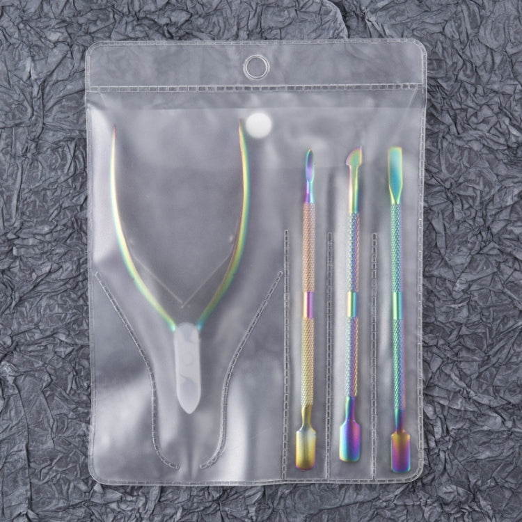 Iridescent stainless steel manicure tool set stored in a clear zip pouch