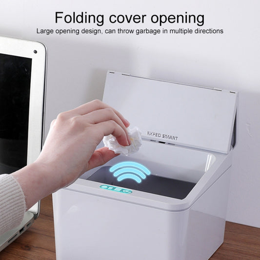 White EXPED SMART electric trash can with lid open and hand removing trash