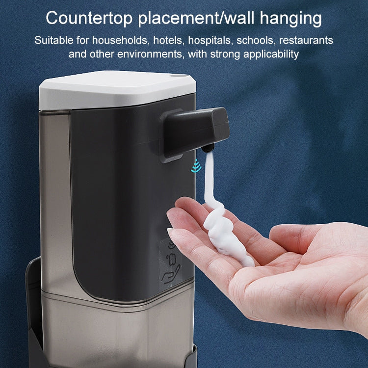 Automatic sensor soap dispenser on countertop with hand pressing nozzle