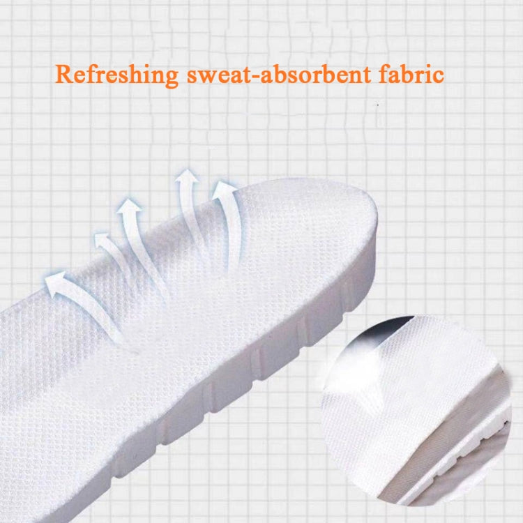 White sports insole with breathable textured fabric and layered cushioning underfoot
