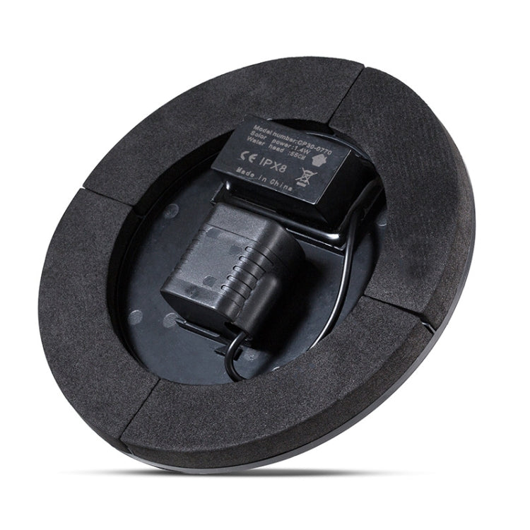 Black floating solar fountain base with visible battery compartment cover