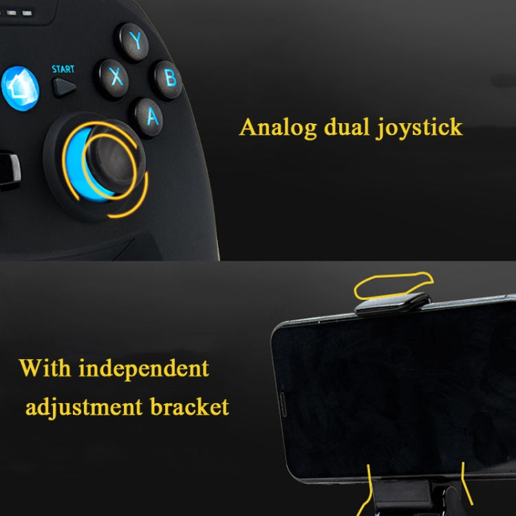 Close-up of black wireless game controller with blue analog stick and phone bracket