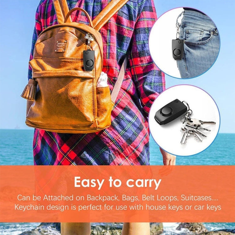 Keychain personal safety alarm attached to a bag with metal clip and keyring