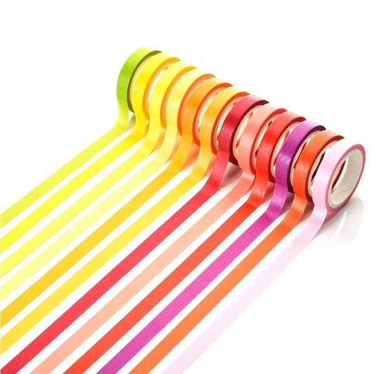 Rainbow striped masking tape strips unrolled from multiple rolls, glossy finish