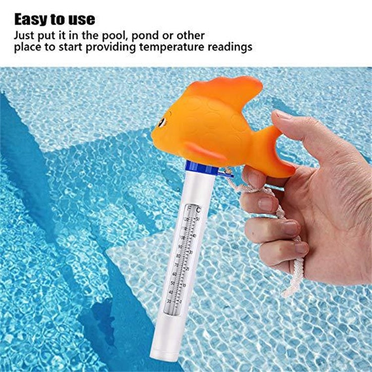 Yellow fish pool thermometer in hand, with clear tube and temperature scale.