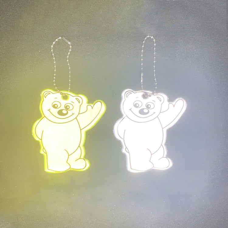 Pair of bear reflective pendants with silver bead chains, green and white glowing