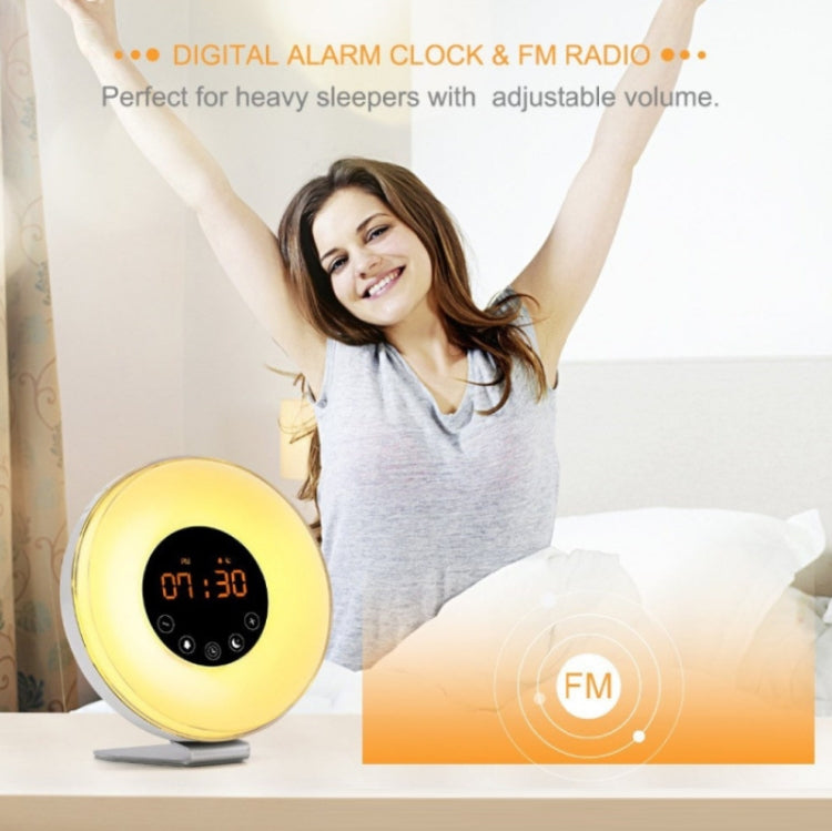 Digital alarm clock with FM radio, gold globe, orange digital time, adjustable volume icon