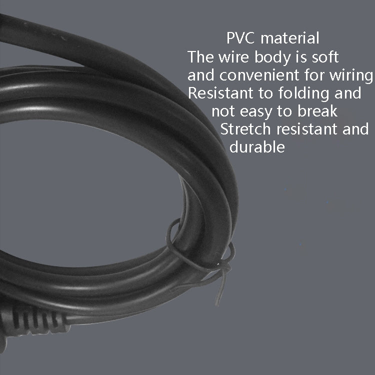 Close-up of black coiled wiring cable, flexible connector cord for adapter use