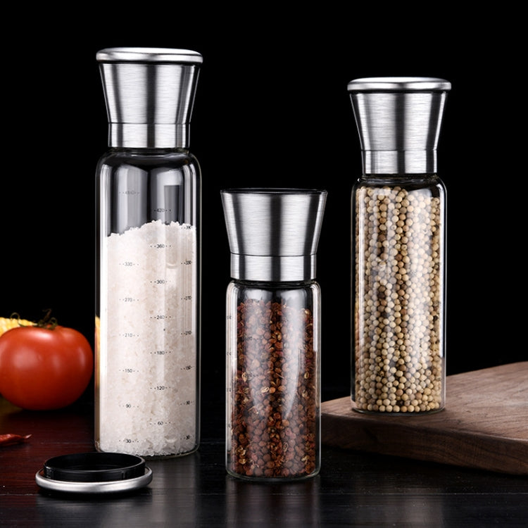 Set of stainless steel manual pepper and salt grinders with clear refill bottles