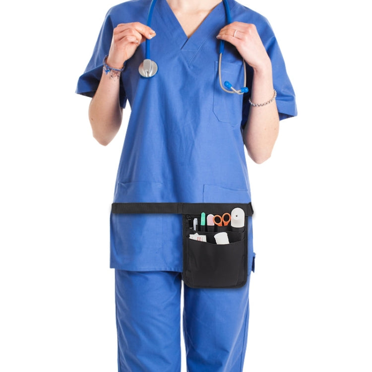Medical uniform with black waist storage bag holding supplies in front pockets