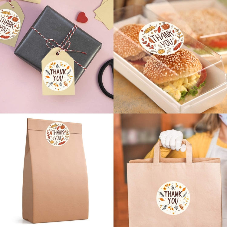 Round "Thank You" floral sticker labels on gift bags and a food box