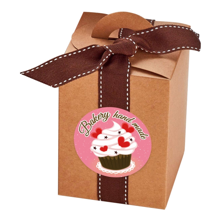 Bakery hand-made cupcake label sticker on kraft gift box with brown ribbon
