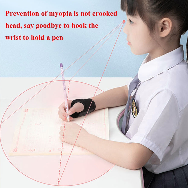 School student wearing a wrist correction belt while holding a pen to write