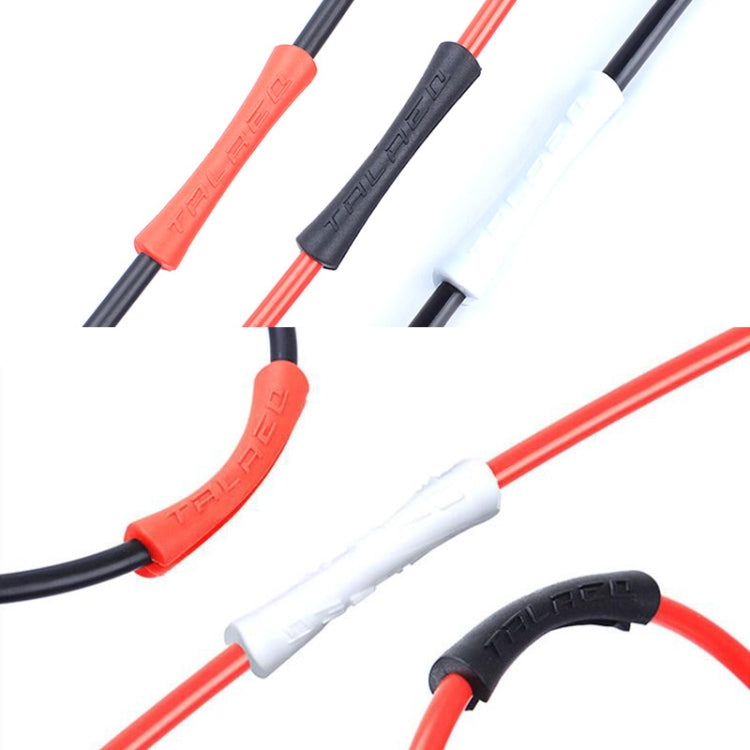 Assorted bicycle cable protective covers in red and black, covering cable ends