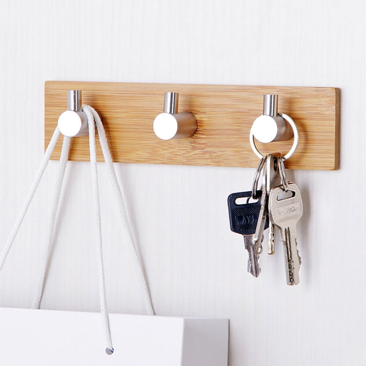 Bamboo wood adhesive door hook bar with three hooks holding keys and cords