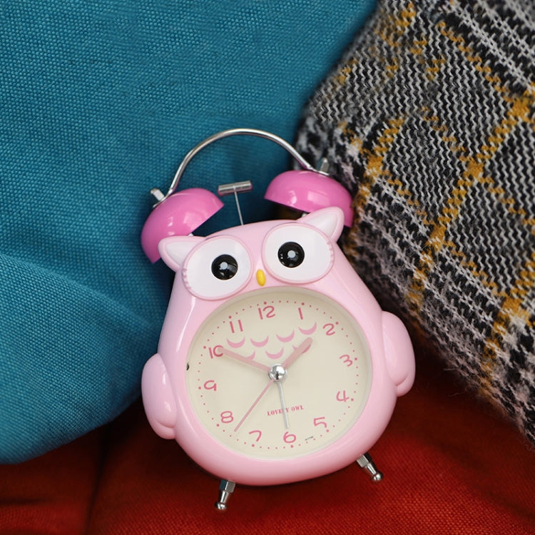 Pink cartoon owl alarm clock with twin bells, round face, and metal feet
