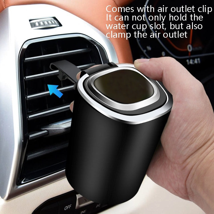 Car ashtray with air-outlet clip, hanging on dashboard vent in black