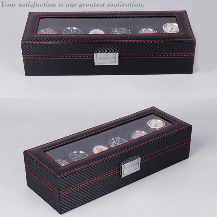 Black watch display box with transparent window and red-trimmed exterior, silver latch.