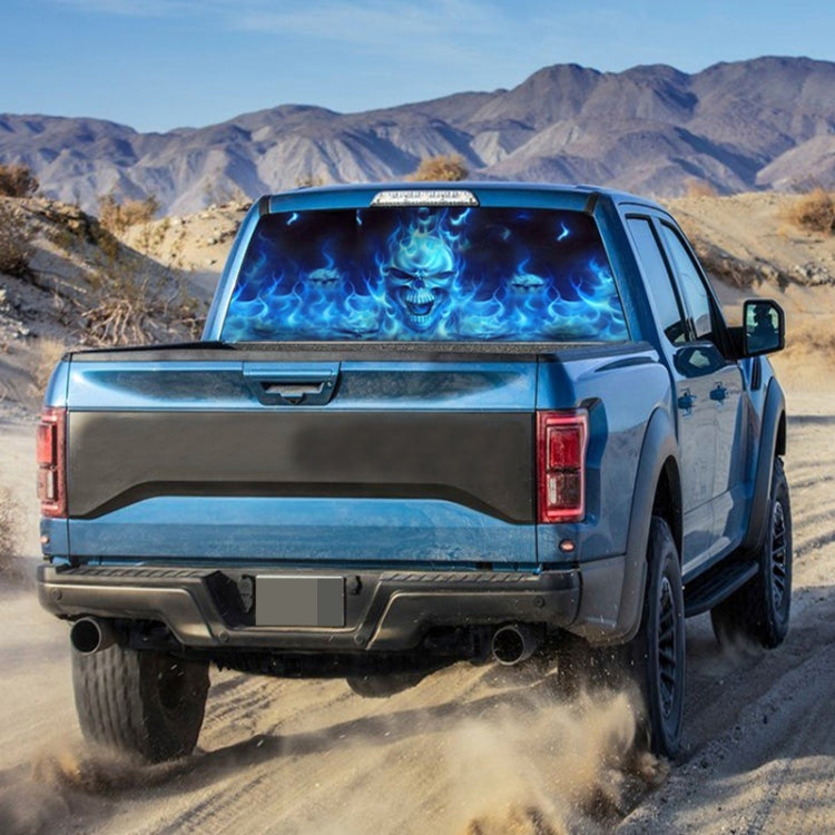 Car rear window sticker with blue skull flames graphic on back window
