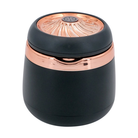 Mini car ashtray with cover closed, black body and rose-gold top with lamp circle