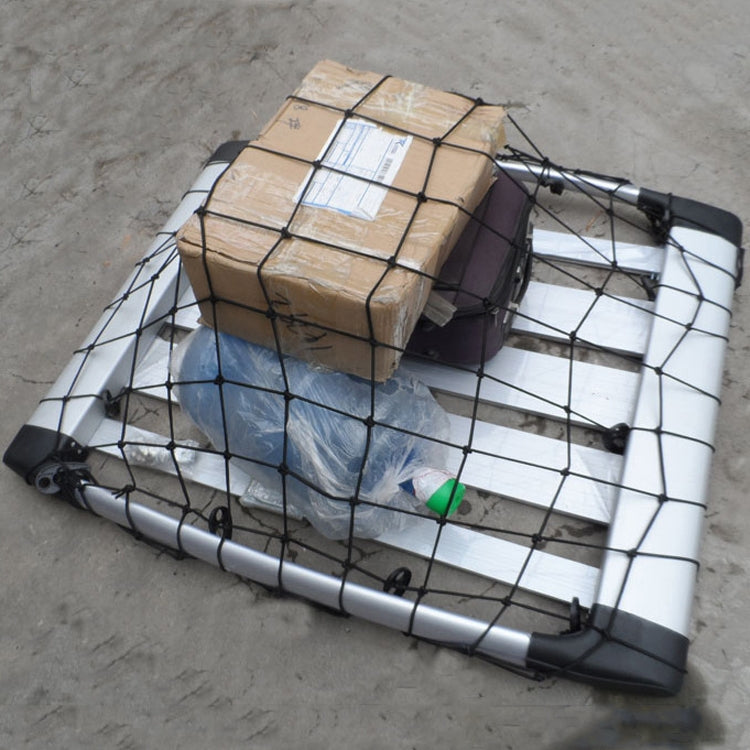 Car cargo net bag securing boxes and luggage on a roof rack