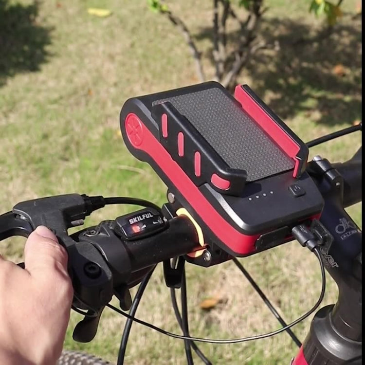 Red and black bicycle front light mobile phone holder mounted on handlebars