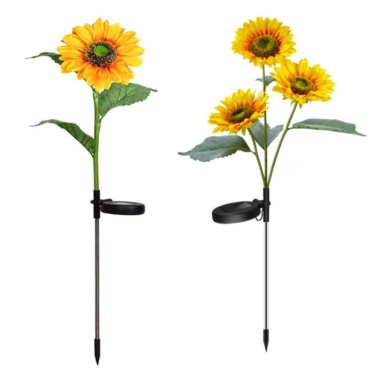 Solar sunflower garden stake light set with four yellow blooms and black bases.