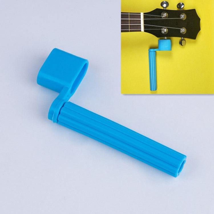 Blue guitar string pulling cone tool with ridged handle and angled head