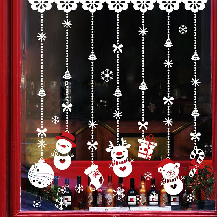 Christmas snowman window sticker close-up with snowmen, gifts, and hanging bells