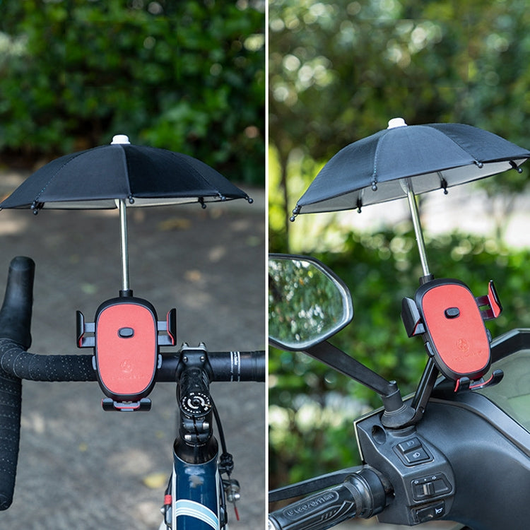 Red bicycle phone bracket mounted on handlebars under an umbrella canopy