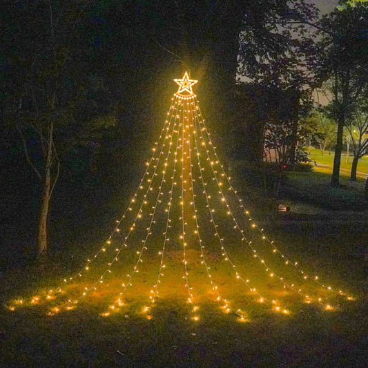 Outdoor LED star waterfall lights with warm yellow glow cascading in cone shape