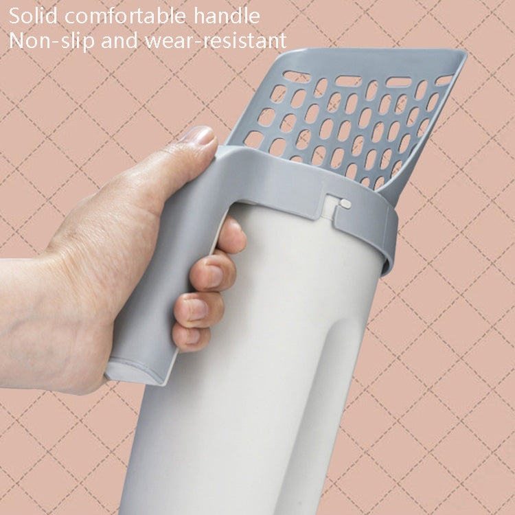 Comfort-grip handle on plastic cat litter scoop with perforated strainer head